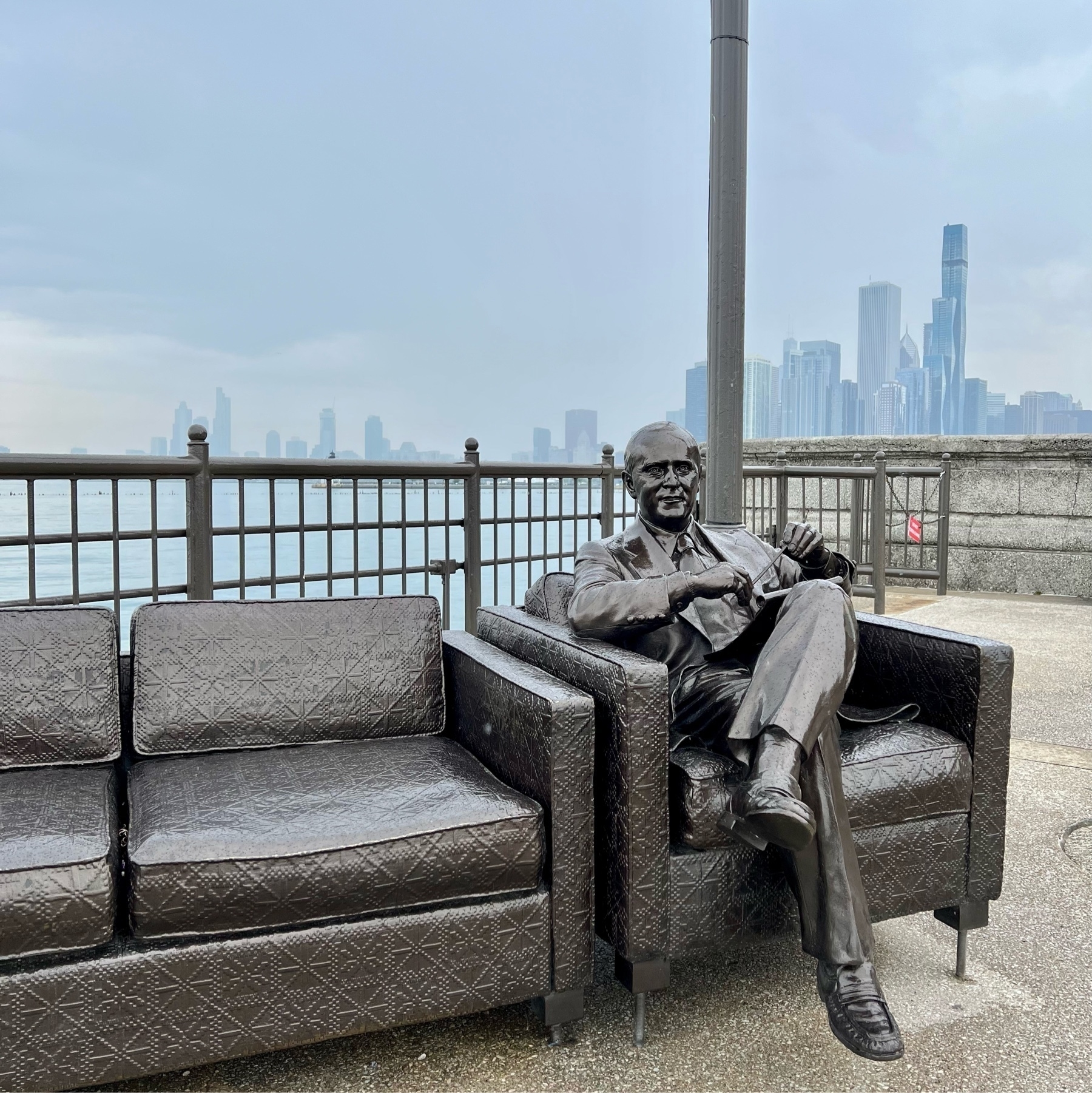 The Bob Newhart statue on Chicago's Navy pier, on a cloudy day.